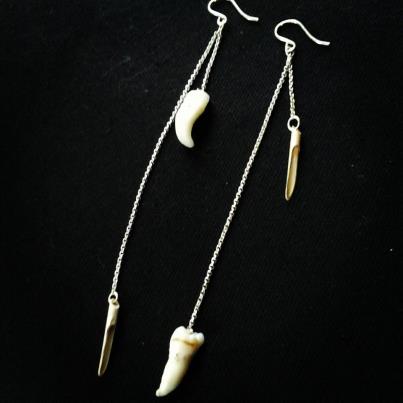 long earrings with teeth